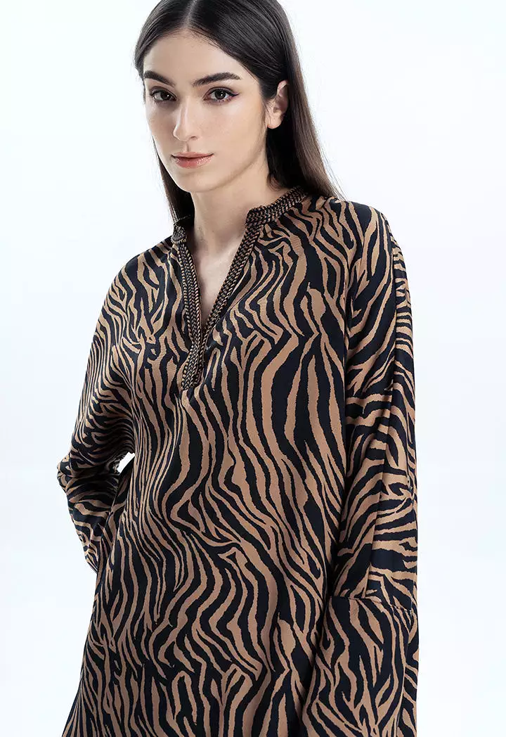 Zebra print blouse with embroidered neckline