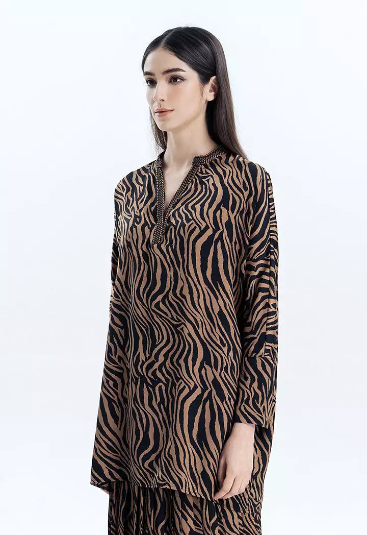 Zebra print blouse with embroidered neckline